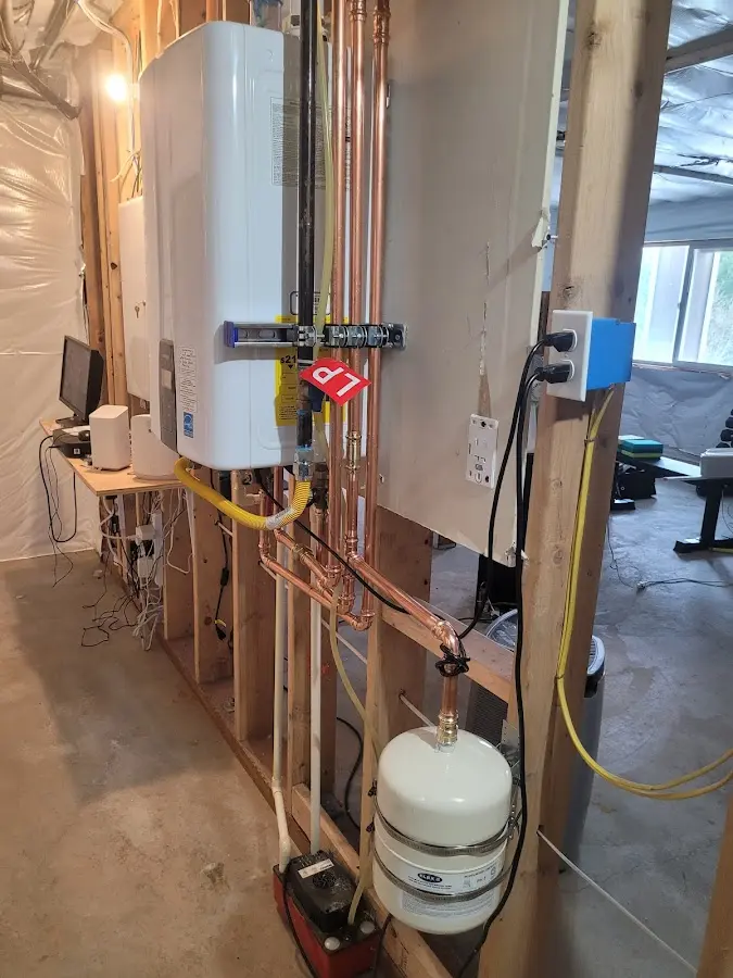 Licensed plumber repairing a kitchen sink in Frederick